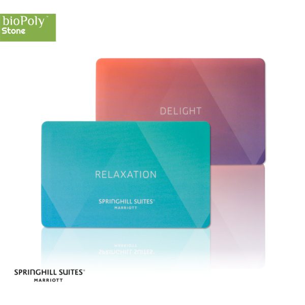 A display of colorful gradient BioPoly stone SpringHill Suites key cards featuring relaxation and delight themes