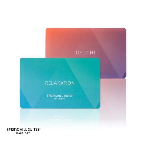 A display of colorful gradient PVC SpringHill Suites key cards featuring relaxation and delight themes
