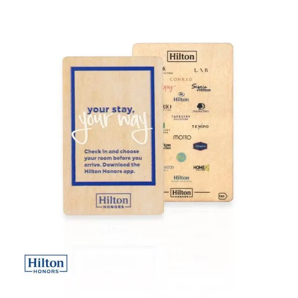 A blue bordered wooden hotel card featuring brand stay slogans and multiple hospitality group logos