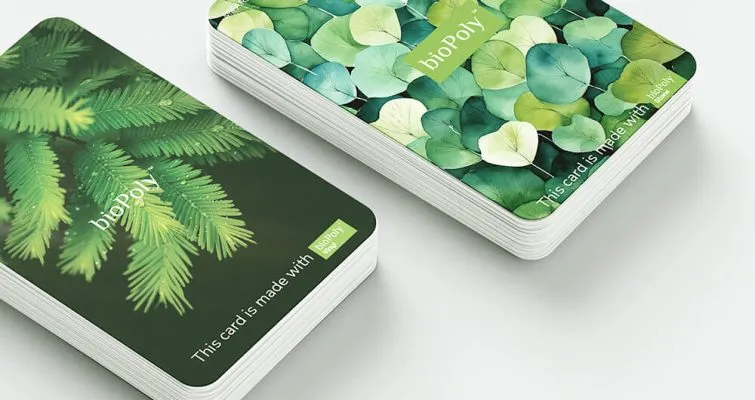 ColorEdge Custom Branded RFID Cards. Premium Color Matched Key Cards two stacks of custom bioPoly RFID cards with green botanical designs, ColorEdge brand integrated customizable hotel key cards